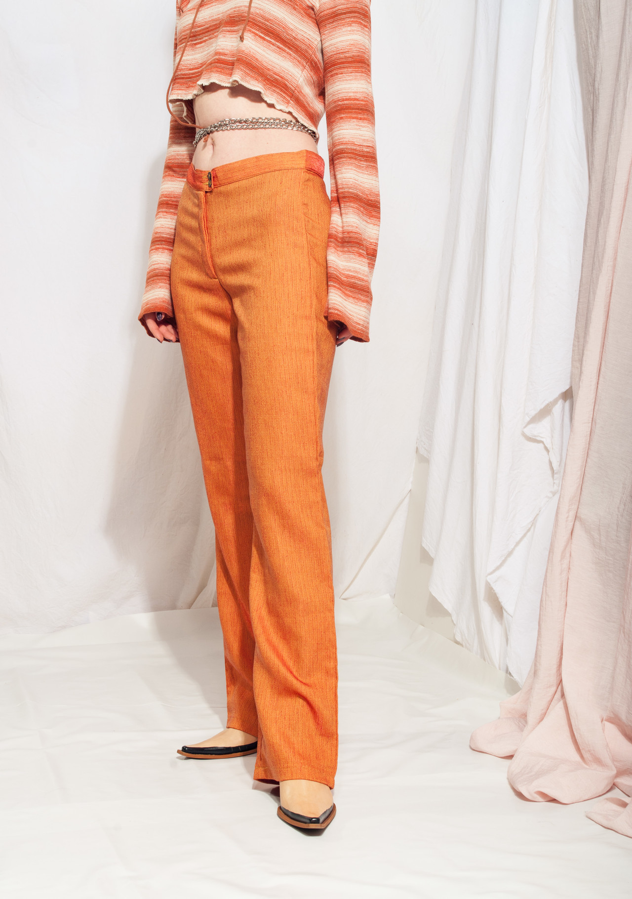 orange flare trousers