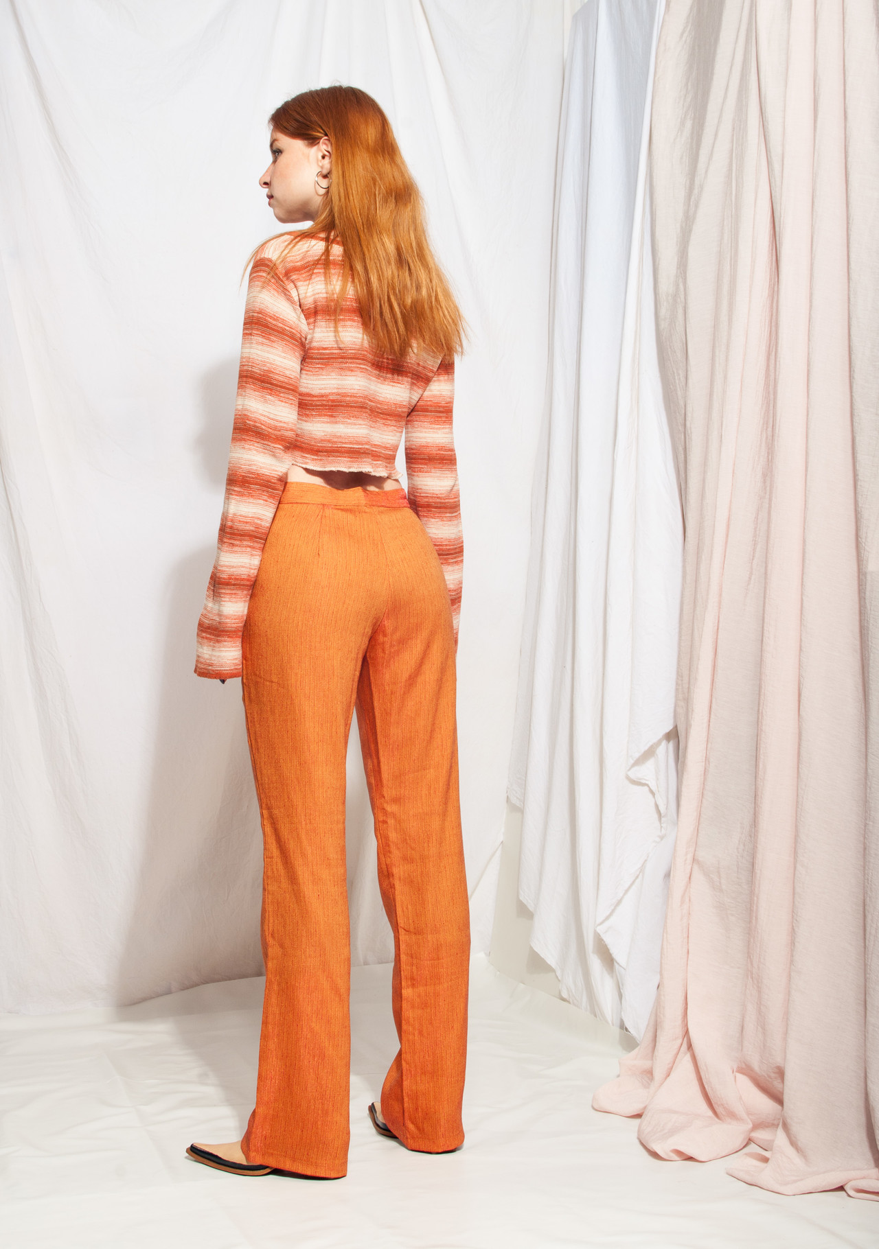 orange flare trousers