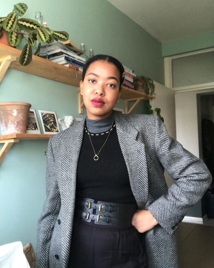 Outfit photo of a person wearing a fall vintage outfit