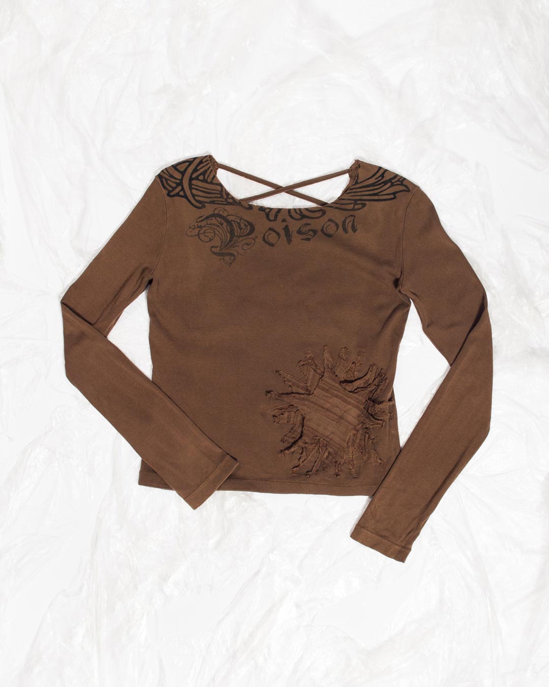 Flat-lay photo of a brown vintage whimsigoth top with long sleeves